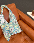 **Overstock** Market Triangle Tote - Marley's Monsters
