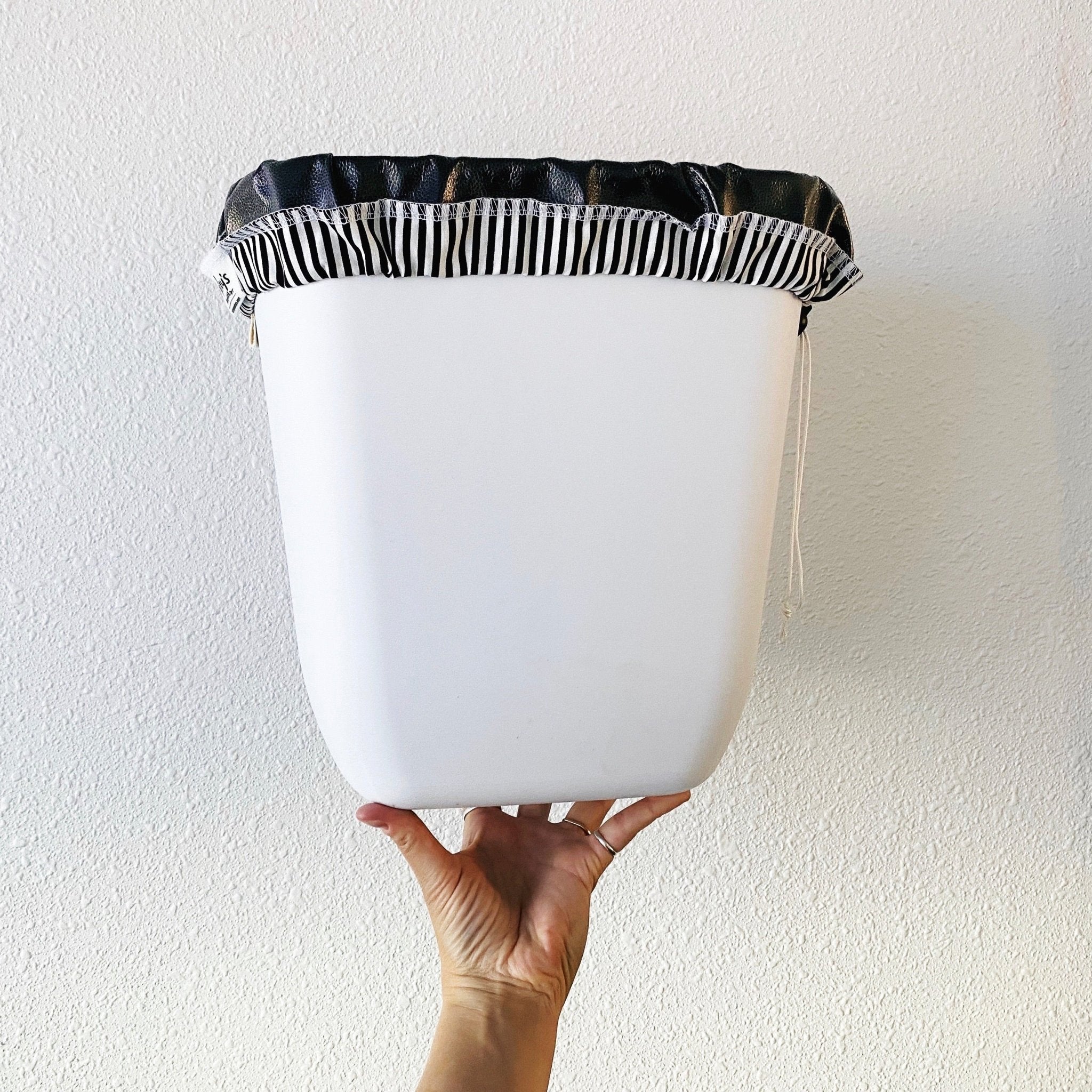 I like this idea. washable liner for your recycling bin.